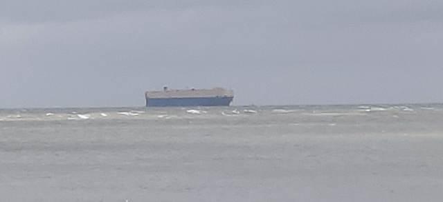 Cargo ship through the mist.