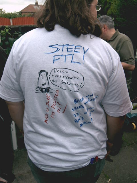 More "art" on Shell's grafitti T-shirt.