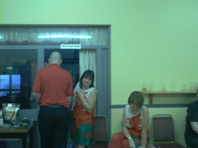 The sign says "Watch Your Head". How can I do that without a mirror?