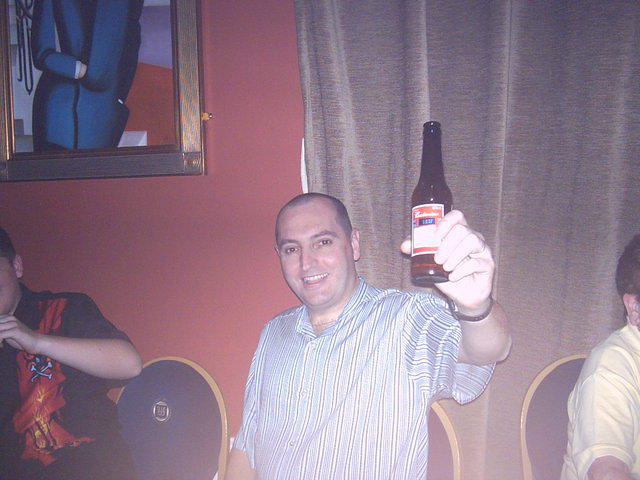 Watching the game, having a Bud!