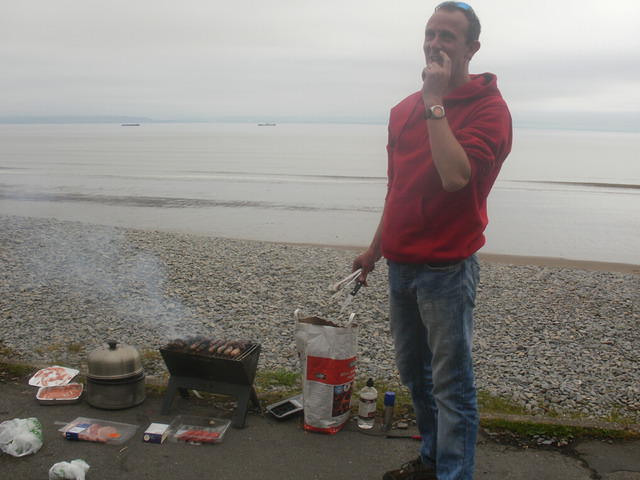 Brian tends the BBQ