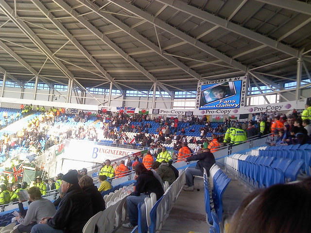 Swansea fans bordered by a large police presence.