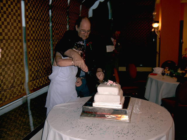 The cutting of the cake.