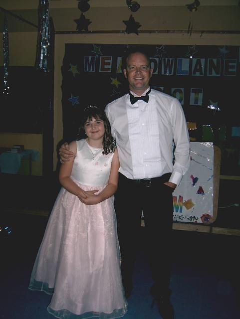 Courtney with the head teacher Mr. Thomas.