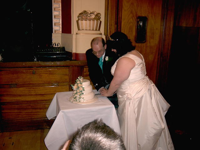 Cutting the cake.