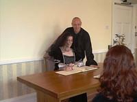 Signing the licence.