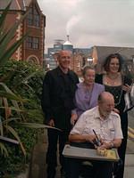 Groom and bride with bride's grandparents.