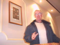 A few more pints and he'll be even more blurry!