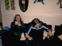 Cathy enjoys her wine while Shell studies her Guinness.