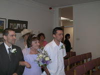 Walking up the aisle.