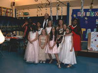 The girls with deputy head Mr. Tucker and Miss Ambarni.