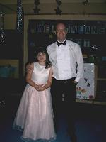 Courtney with the head teacher Mr. Thomas.